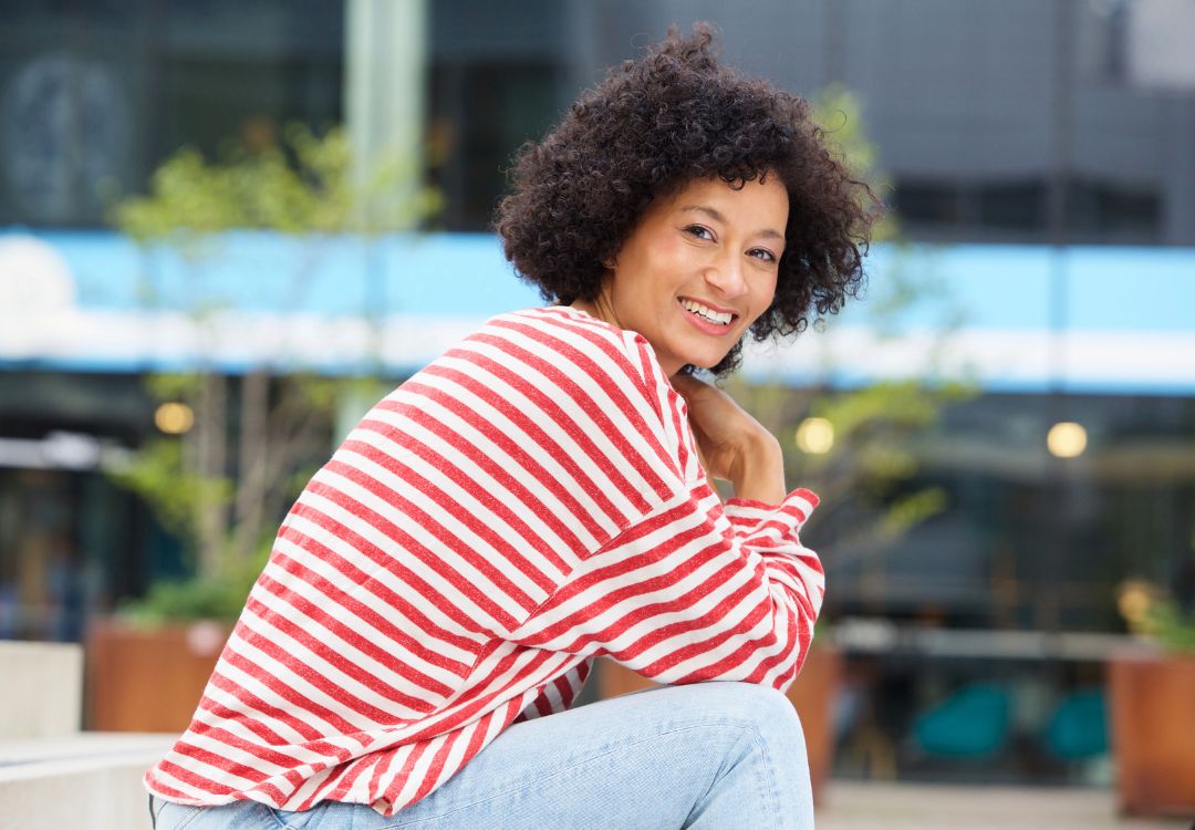 Confident smiling natural health professional after successfully preparing for AHPLEX exam